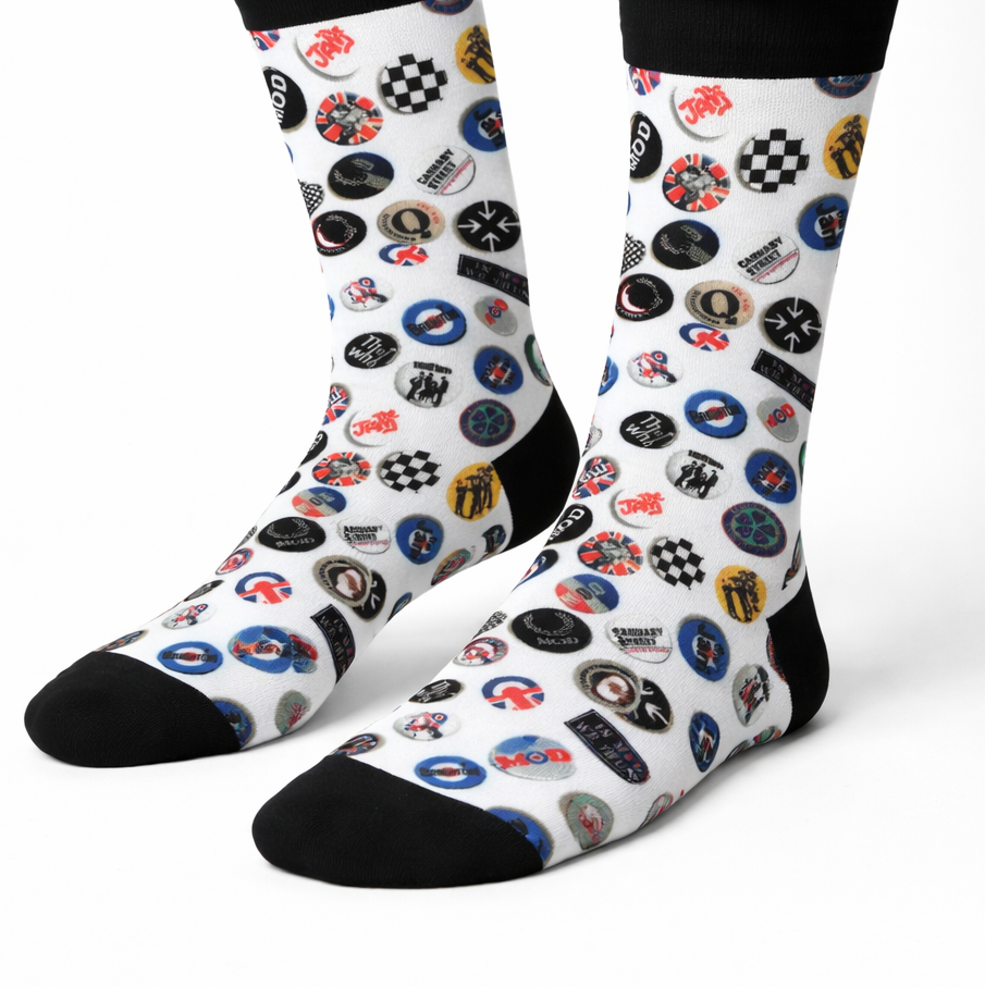Mod badge socks in white with black heel and toe worn on feet by Sauce & Brown