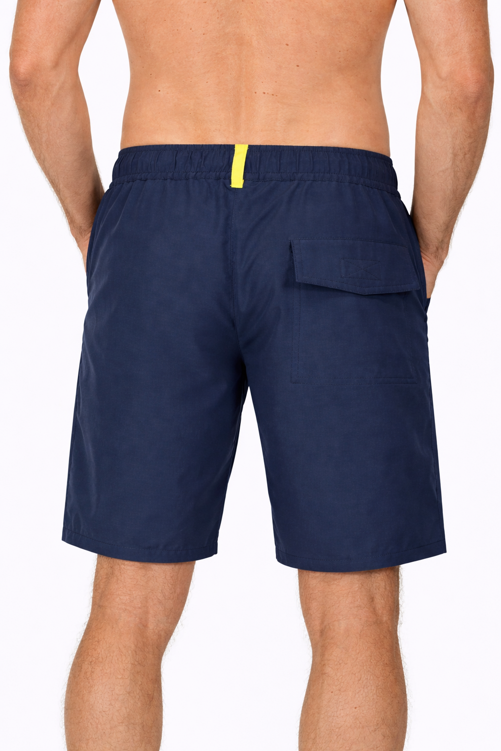 Rear view of Tempest Swim Shorts in navy worn by model by Sauce & Brown