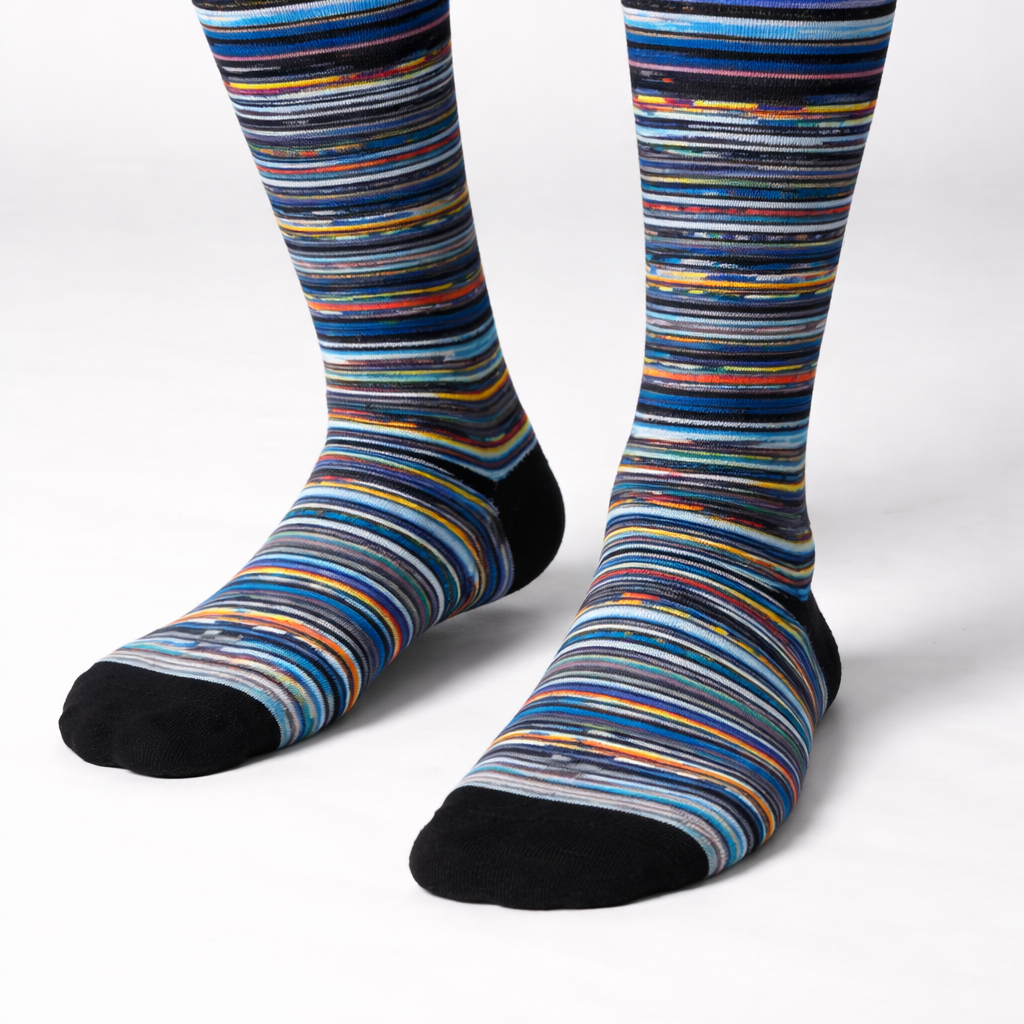 Vinyl Print Socks in multicolour stripe design worn on feet by Sauce & Brown