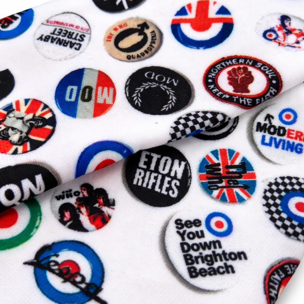 Close-up detail of Mod badge print on white socks by Sauce & Brown