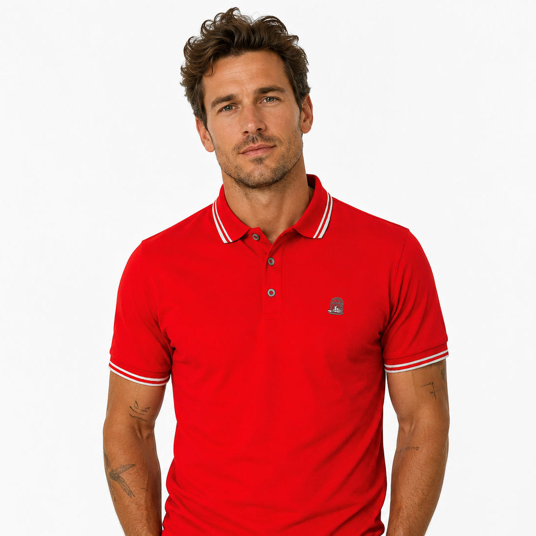 White male model wearing the Sauce & Brown Forza red tipped polo shirt against a clean studio background