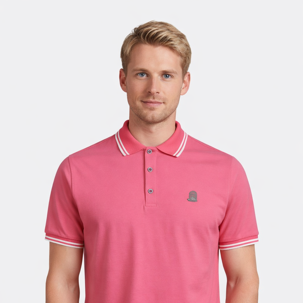 Axel Polo in pink with embroidered chest logo worn by model by Sauce & Brown