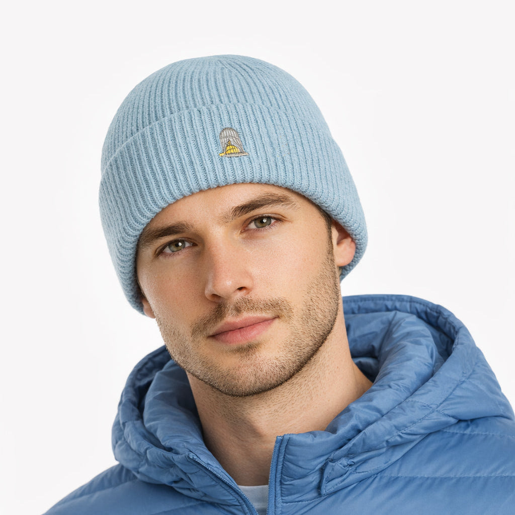 Model wearing Drift Beanie in Ice Blue with embroidered logo by Sauce & Brown
