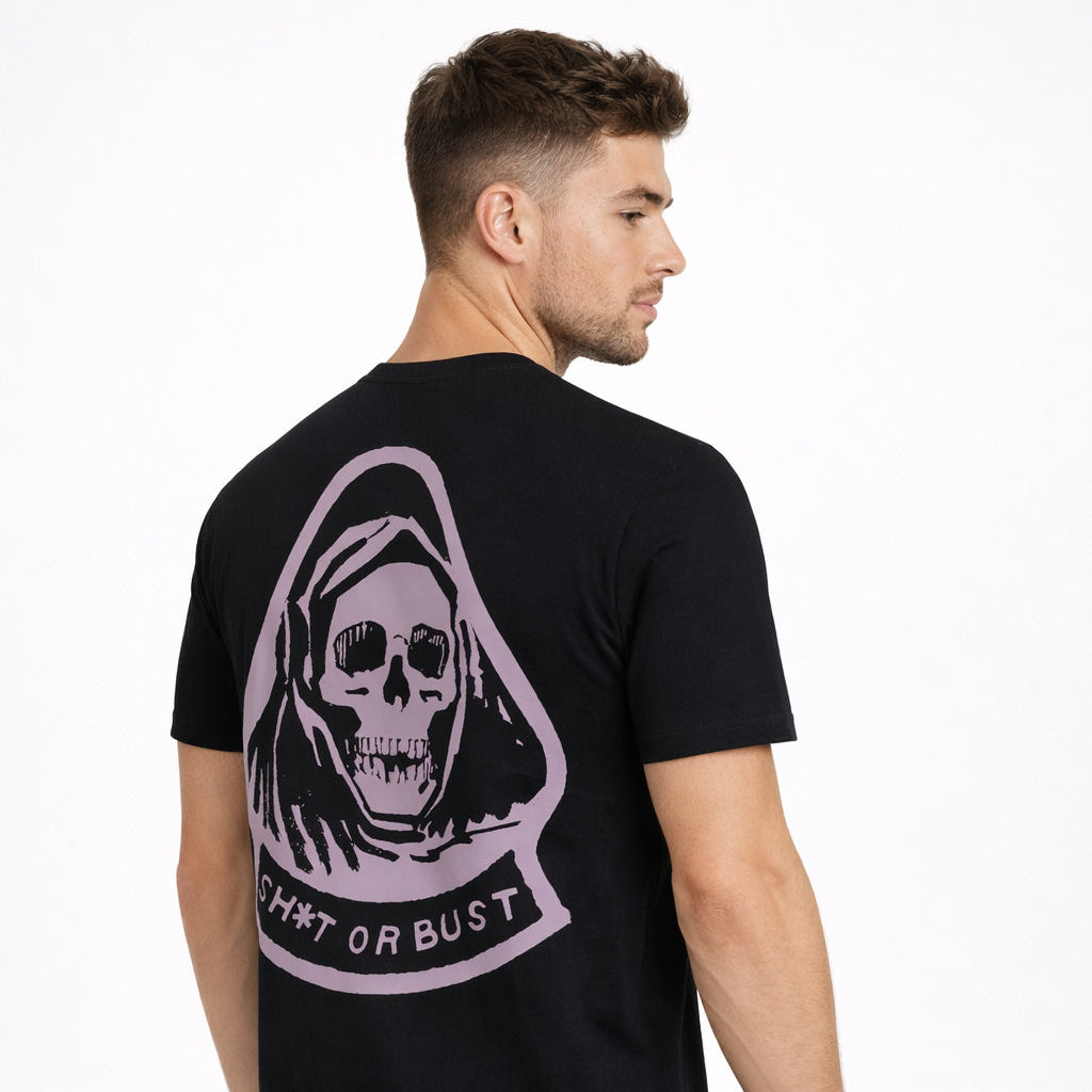 Angled rear view of Fear City T-Shirt in black with lilac back graphic by Sauce & Brown