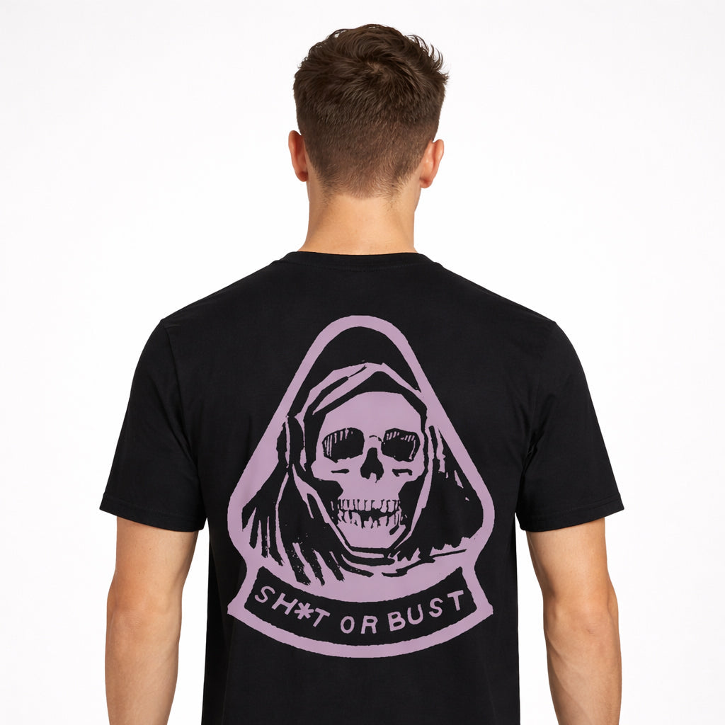 Rear view of Fear City T-Shirt in black with large lilac back graphic worn by model by Sauce & Brown