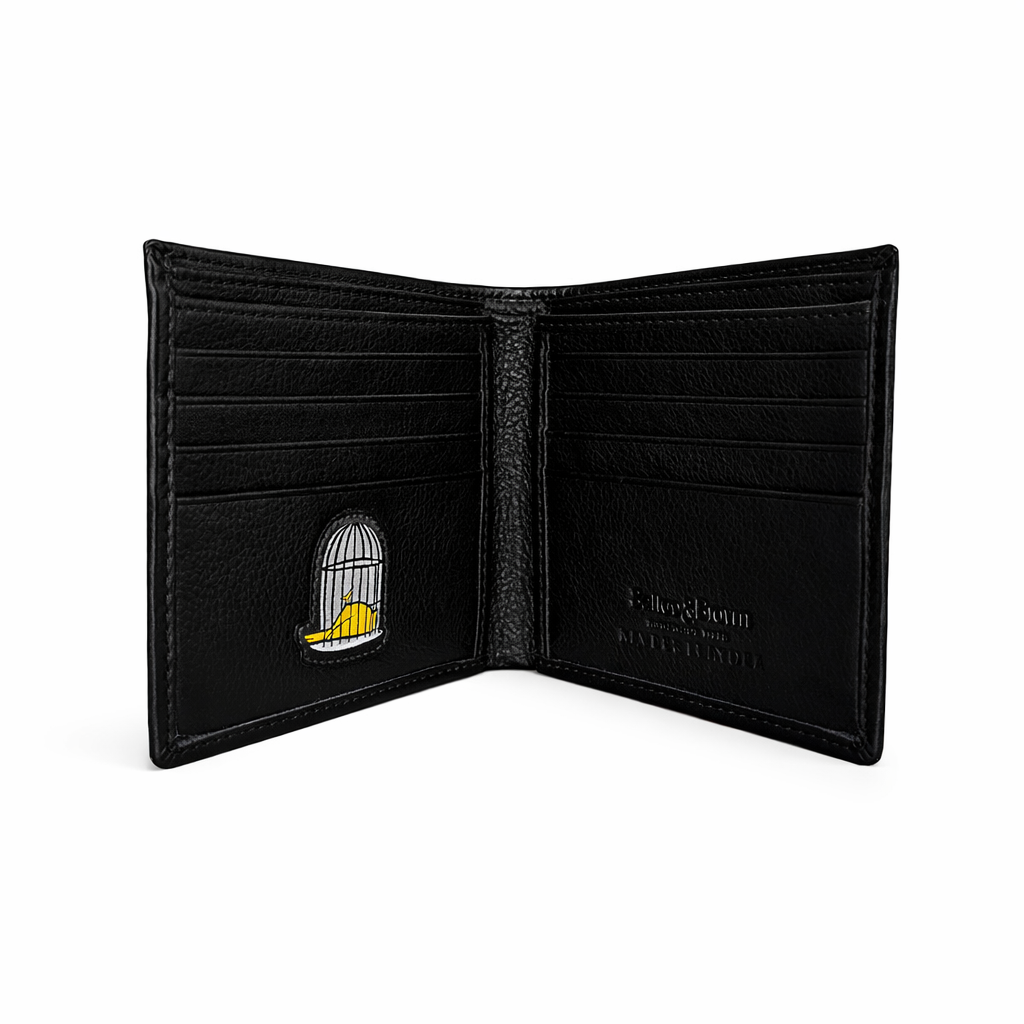 Open black leather credit card wallet showing full interior layout by Sauce & Brown