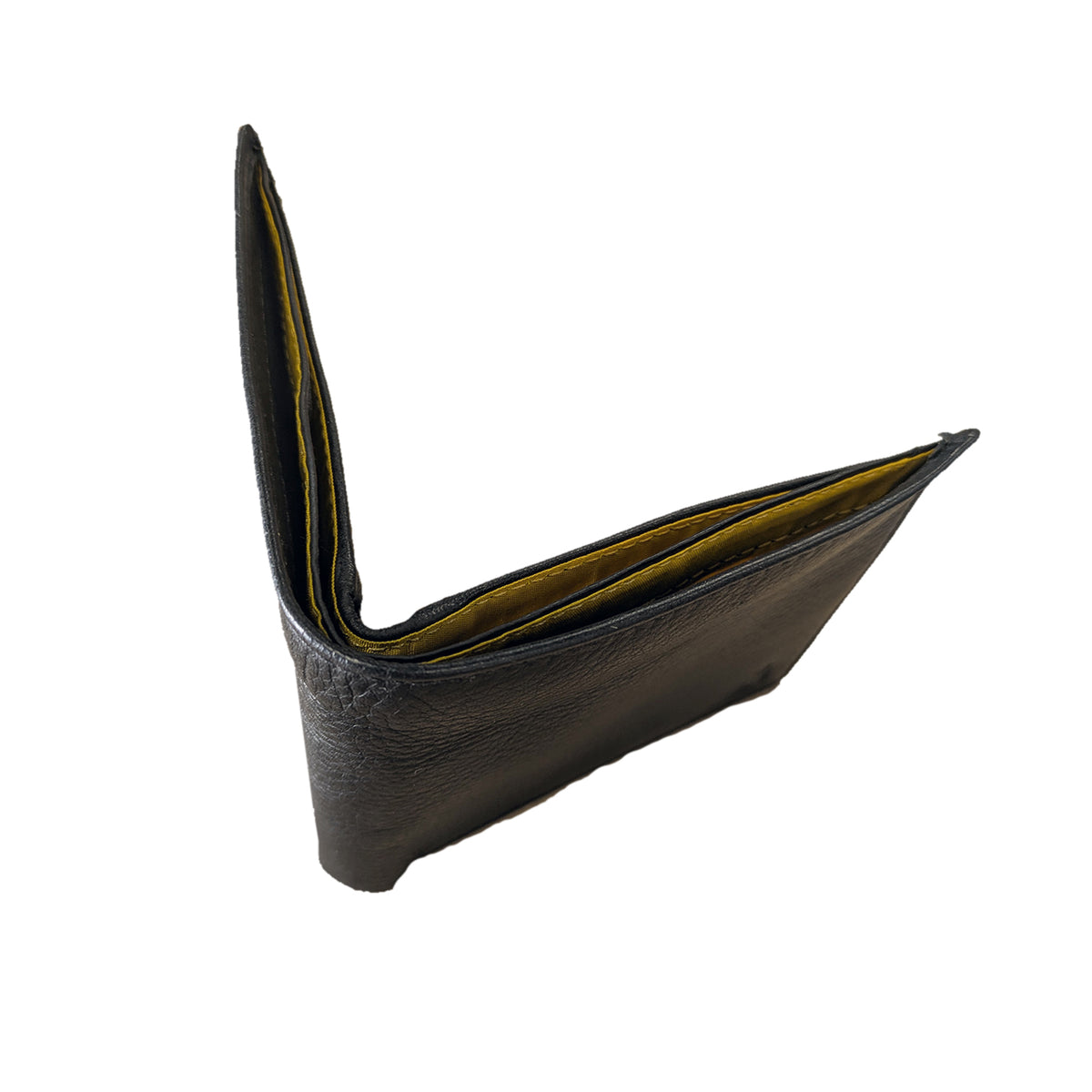 Side profile of black leather credit card wallet showing slim design by Sauce & Brown