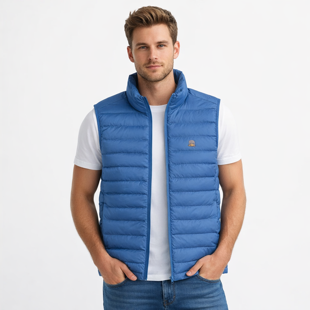 Luna Gilet in blue with embroidered chest logo worn by model by Sauce & Brown