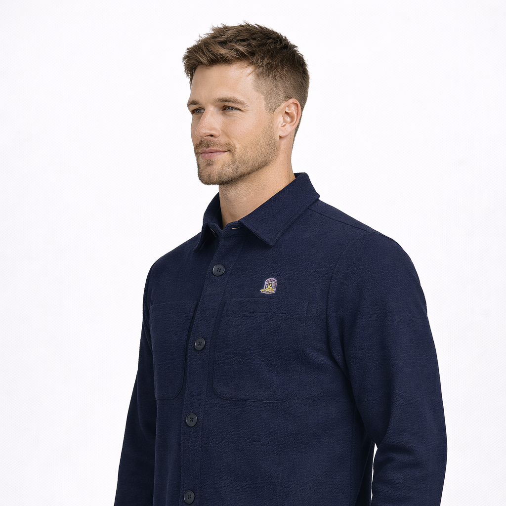 Angled view of North Jacket in navy worn by model by Sauce & Brown