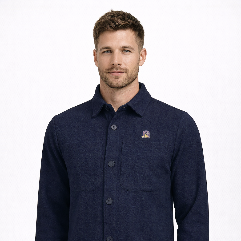 North Jacket in navy with embroidered chest logo worn by model by Sauce & Brown