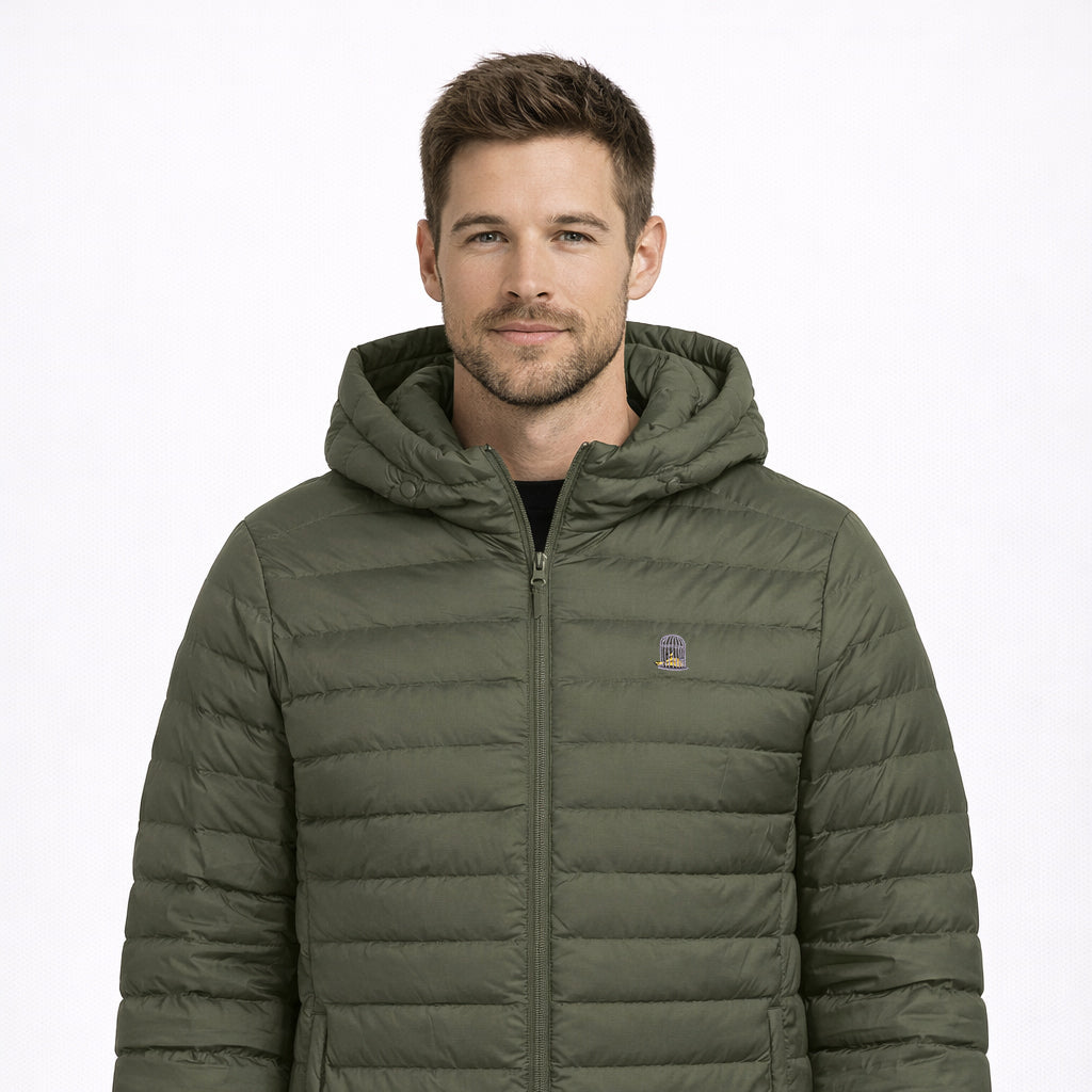 Siege Jacket in olive green with embroidered chest logo worn by model by Sauce & Brown