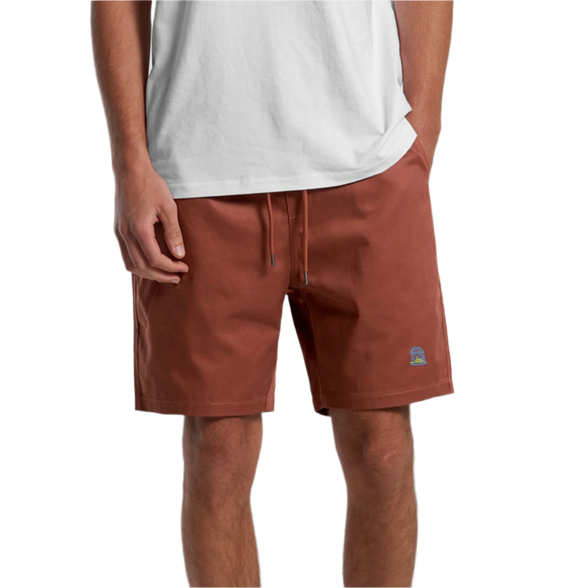 Alternate front view of Terra Shorts in earth red worn by model by Sauce & Brown