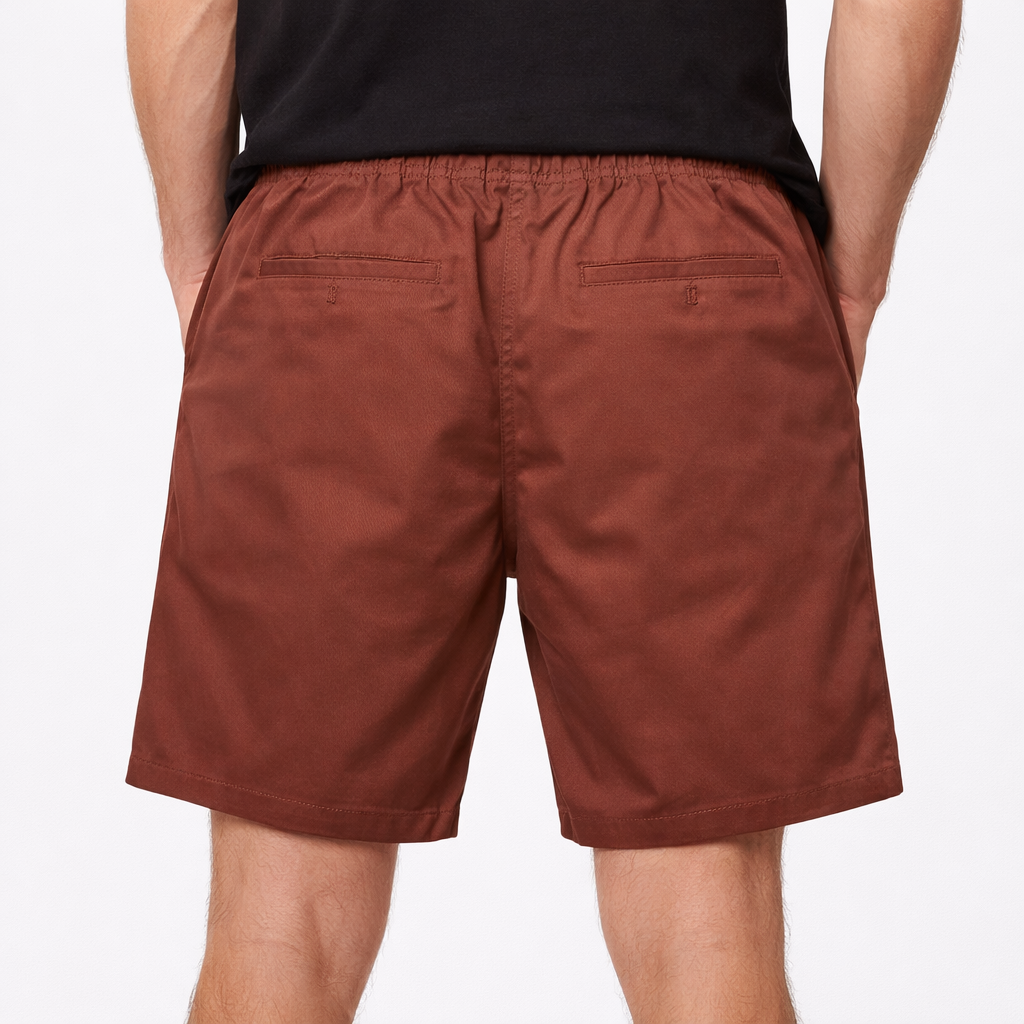Rear view of Terra Shorts in earth red worn by model by Sauce & Brown