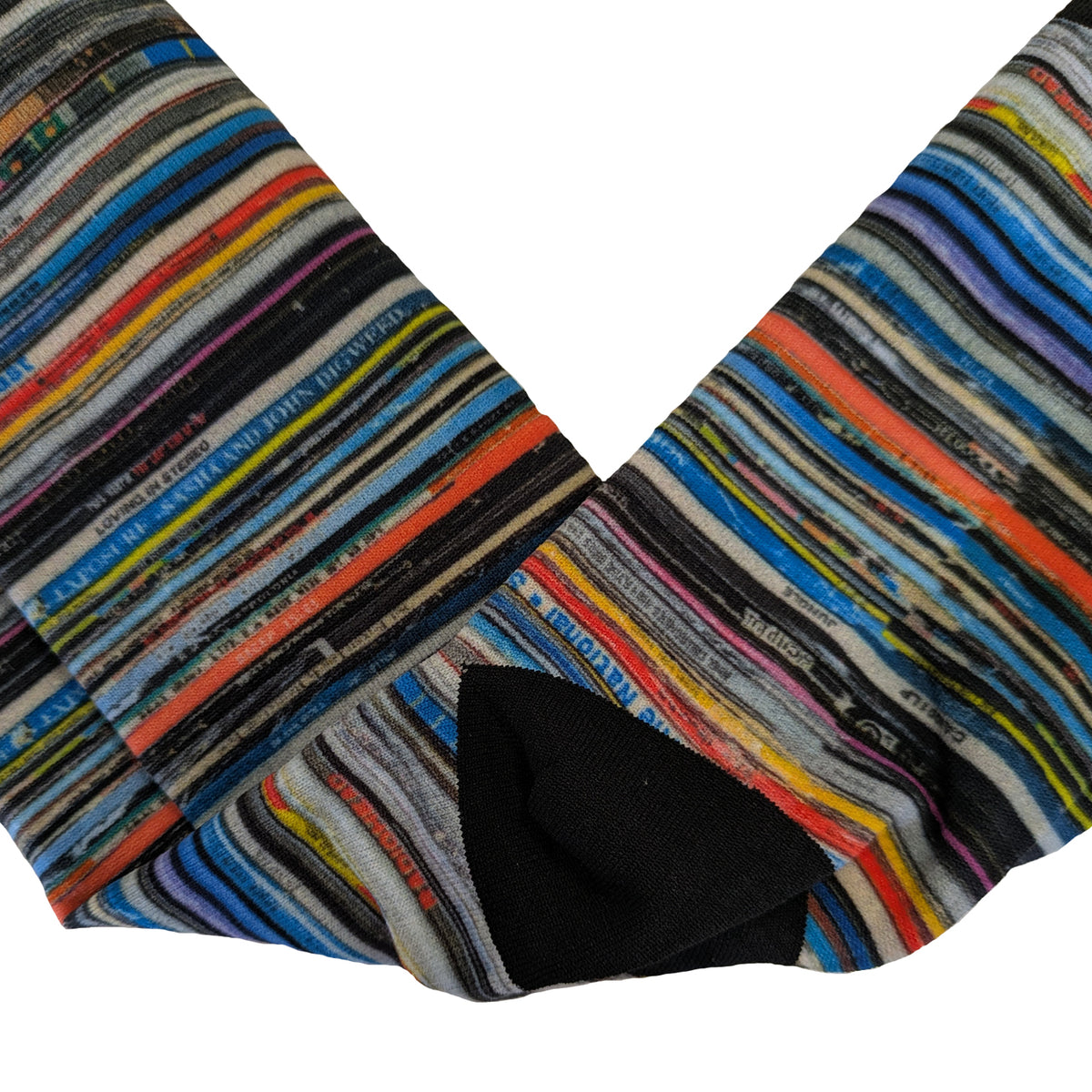 Close-up of Vinyl Print Socks in multicolour stripe pattern with black heel and toe by Sauce & Brown