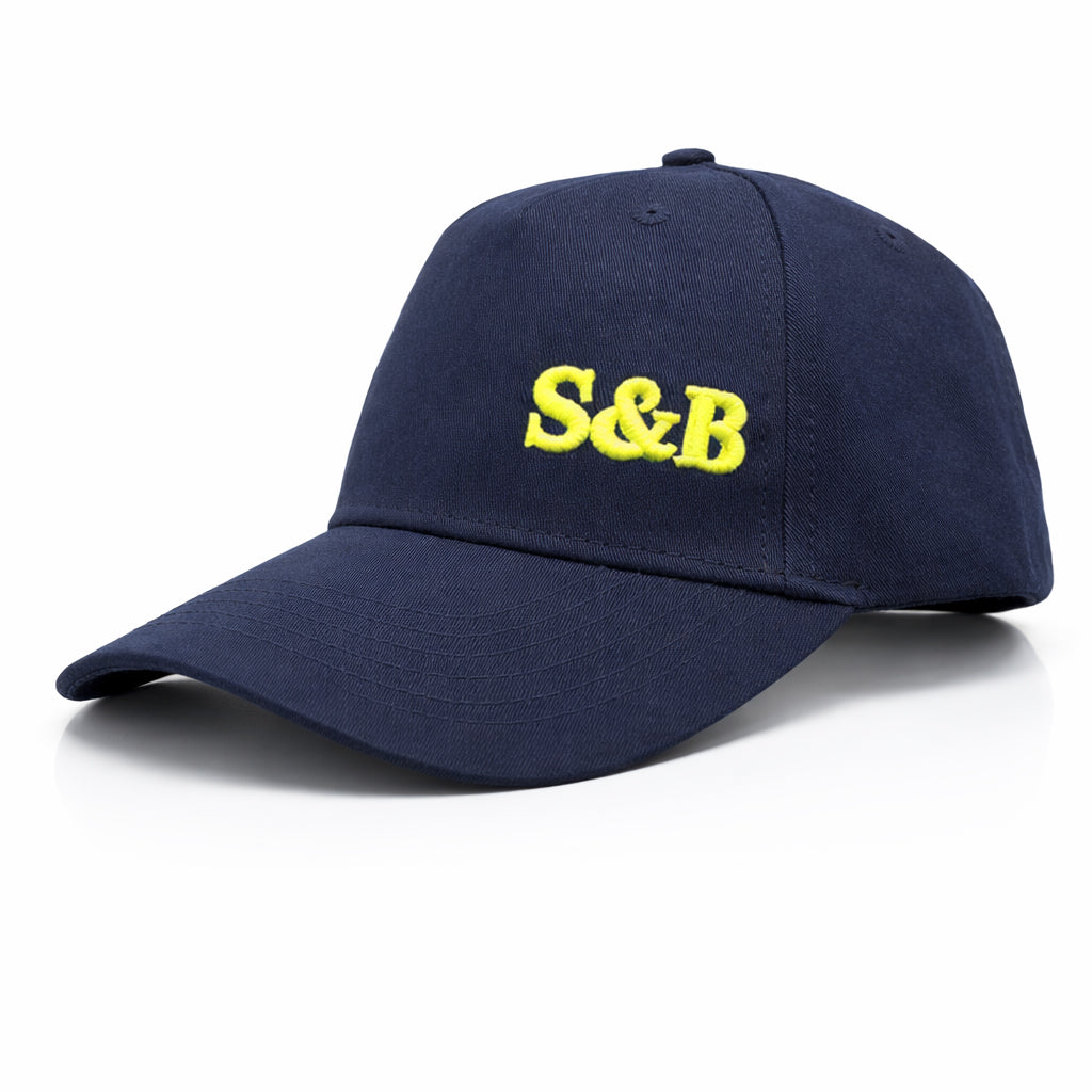 Youth Cap in navy with yellow embroidered S&B logo by Sauce & Brown