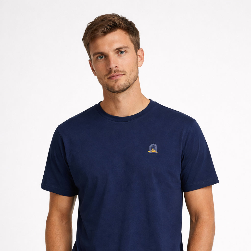 Sauce & Brown navy t-shirt with embroidered chest badge front view on model