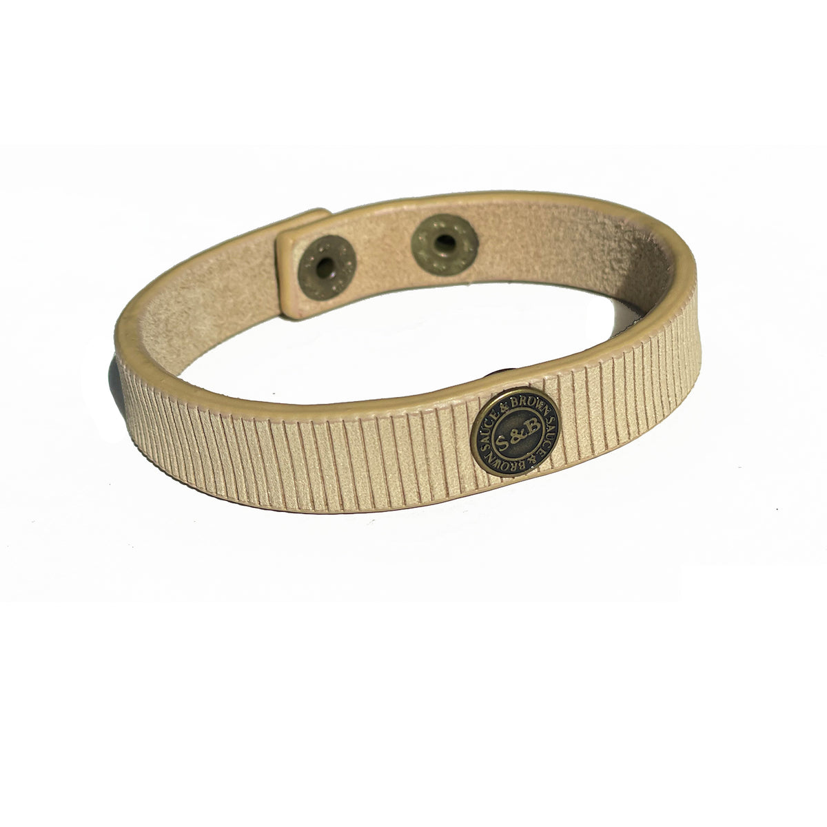 Beige leather band with embossed logo and metal snap fastening by Sauce & Brown